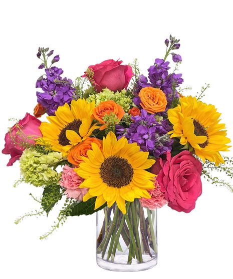 Brightly colored hydrangeas, roses and sunflowers.