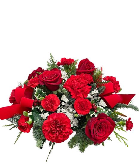 carnation, roses, christmas greens, pine cones, cinnamon, plaid ribbon, wicker basket