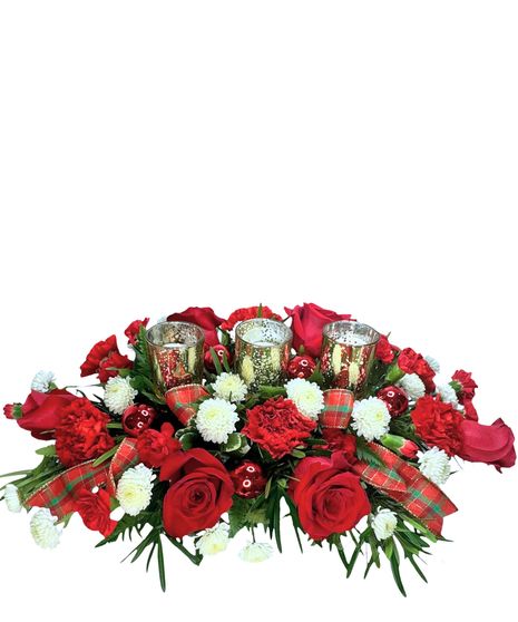 carnation, roses, christmas greens, pine cones, cinnamon, plaid ribbon, wicker basket