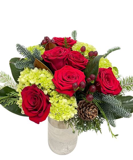 carnation, roses, christmas greens, pine cones, cinnamon, plaid ribbon, wicker basket