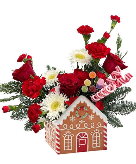 carnation, roses, christmas greens, pine cones, cinnamon, plaid ribbon, wicker basket